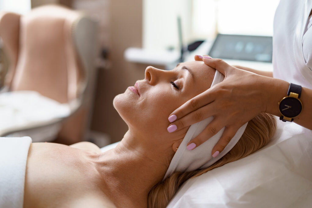 woman receiving face massage