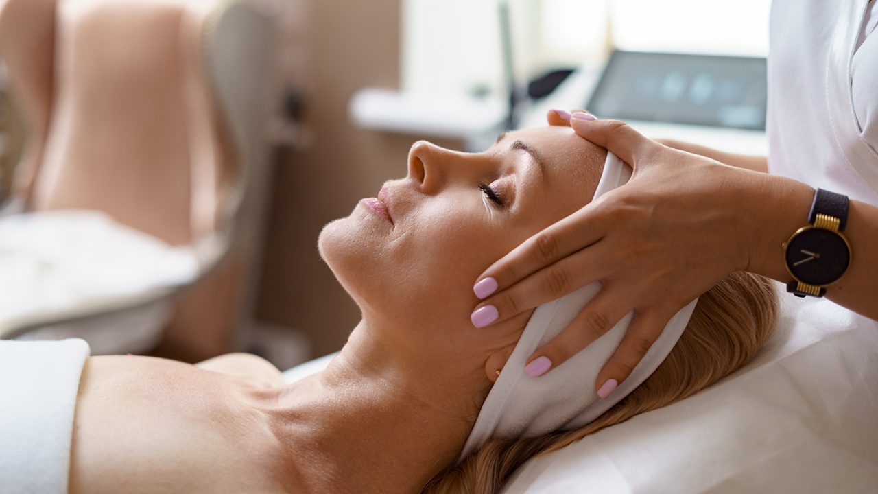 woman receiving face massage